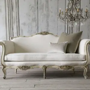 Ivory Curved Sofa with Carved Details
